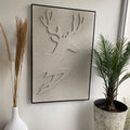 Cuadro Decorativo Ciervo 120x80 Onnas colgado en la pared