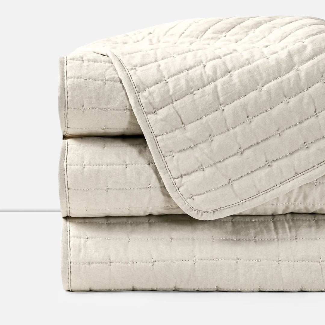Piecera 2 Plazas Beige American Family doblada, detalle del acolchado