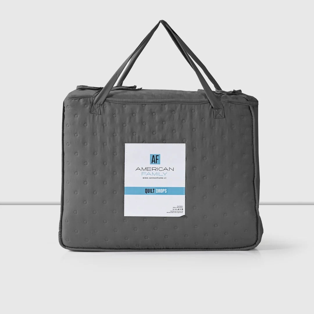 Quilt Drops Gris Oscuro American Family en su bolsa con asas