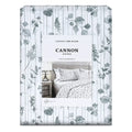 Sábana Pradela Cannon sobre cama, botánico gris a lápiz con rayas verticales