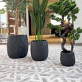 Set de 3 Maceteros Negros Texturados Onnas, con relieve ondulado (plantas no incluidas)