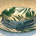 Set de loza 12 piezas Doral diseño tropical, platos apilados
